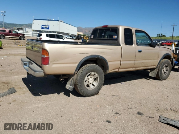 1999 Toyota Tacoma with VIN 4TAWN72N4XZ560411, listed as a Copart auction lot 61499925 with 395,215 mi miles and Salvage title. Bid and sale history available at DreamBid. Image 3.
