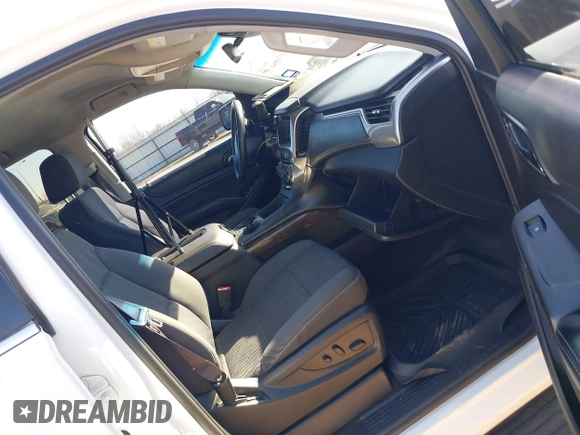 2015 Chevrolet Tahoe LS with VIN 1GNSCAKCXFR748554, listed as a IAAI auction lot 41765865 with 160,282 mi miles and . Bid and sale history available at DreamBid. Image 5.