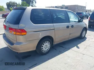 2003 Honda Odyssey LX z VIN 5FNRL18553B154939, wystawiony jako IAAI lot #42168547 z przebiegiem 258 688 mil mil oraz . Historia ofert i sprzedaży dostępna na DreamBid. Obrazek 4.