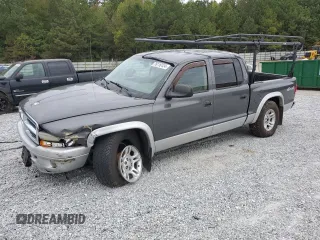 2003 Dodge Dakota SLT with VIN 1D7HG48N63S312294, listed as a Copart auction lot 76116124 with 101,584 mi miles and Salvage Title. Bid and sale history available at carsss.com. Image 1.