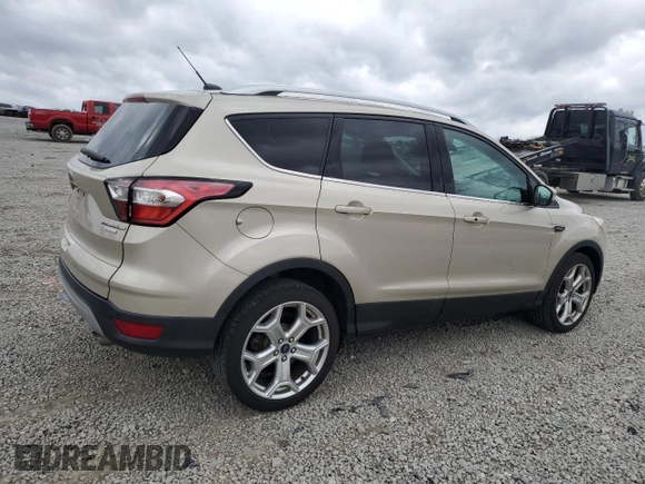 2017 Ford Escape Titanium with VIN 1FMCU0J98HUD75004, listed as a Copart auction lot 51627805 with 74,166 mi miles and Salvage Title. Bid and sale history available at carsss.com. Image 3.