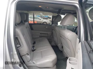 2014 Honda Pilot Touring with VIN 5FNYF4H91EB011934, listed as a IAAI auction lot 41929415 with 227,343 mi miles and . Bid and sale history available at DreamBid. Image 8.