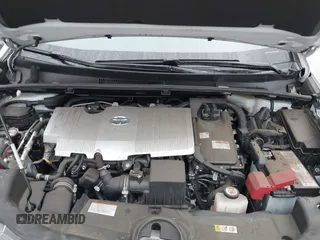 2021 Toyota Prius L Eco with VIN JTDKAMFU6M3150707, listed as a IAAI auction lot 41867272 with 55,499 mi miles and . Bid and sale history available at DreamBid. Image 10.