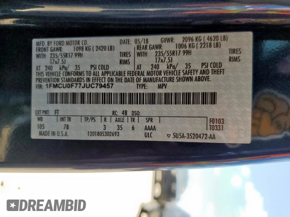 2018 Ford Escape S with VIN 1FMCU0F77JUC79457, listed as a Copart auction lot 59812235 with 54,272 mi miles and Salvage title. Bid and sale history available at DreamBid. Image 14.