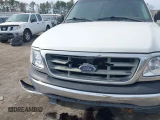 2000 Ford F-150 XL with VIN 1FTRX17LXYNC39983, listed as a IAAI auction lot 41750277 with 170,016 mi miles. Bid and sale history available at carsss.com. Image 6.