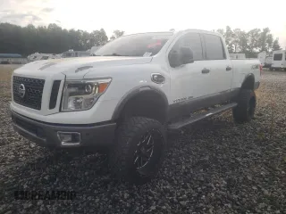 2016 Nissan Titan XD PRO-4X with VIN 1N6BA1F47GN511091, listed as a Copart auction lot 70413644 with 204,561 mi miles and Clean Title. Bid and sale history available at carsss.com. Image 1.