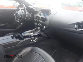 2020 Aston Martin Vantage z VIN SCFSMGAW4LGN03097, wystawiony jako IAAI lot #42227516 z przebiegiem Nie podano mil oraz . Historia ofert i sprzedaży dostępna na DreamBid. Obrazek 5.