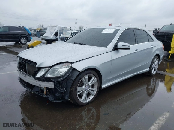 2013 Mercedes-Benz E-Class E 350 Luxury with VIN WDDHF8JB1DA720607, listed as a IAAI auction lot 41514018 with 135,926 mi miles. Bid and sale history available at carsss.com. Image 2.