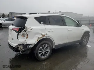 2017 Toyota RAV4 Hybrid XLE with VIN JTMRJREV6HD071592, listed as a Copart auction lot 43804115 with 57,082 mi miles and Salvage Title. Bid and sale history available at carsss.com. Image 3.