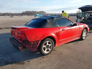 2004 Ford Mustang Deluxe with VIN 1FAFP44644F221637, listed as a IAAI auction lot 41625384 with 123,424 mi miles. Bid and sale history available at carsss.com. Image 4.