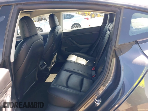 2022 Tesla Model 3 with VIN 5YJ3E1EA6NF144098, listed as a IAAI auction lot 41965360 with 75,597 mi miles. Bid and sale history available at carsss.com. Image 8.