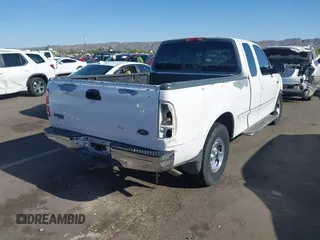 1998 Ford F-150 with VIN 1FTZX1720WKB74924, listed as a IAAI auction lot 42046778 with 240,725 mi miles and . Bid and sale history available at DreamBid. Image 4.