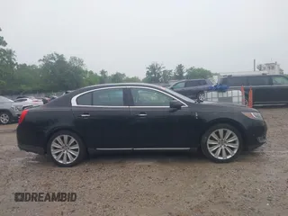 2013 Lincoln MKS EcoBoost with VIN 1LNHL9FT4DG607785, listed as a IAAI auction lot 42279833 with 126,548 mi miles and . Bid and sale history available at DreamBid. Image 13.