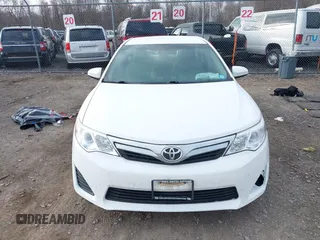 2014 Toyota Camry L with VIN 4T4BF1FKXER374901, listed as a IAAI auction lot 41861839 with 130,990 mi miles and . Bid and sale history available at DreamBid. Image 12.
