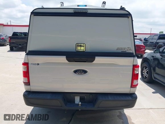 2021 Ford F-150 XL with VIN 1FTMF1CB2MKD85770, listed as a IAAI auction lot 42175883 with 129,366 mi miles and . Bid and sale history available at DreamBid. Image 17.