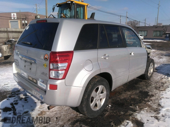 2013 Suzuki Grand Vitara Premium z VIN JS3TD0D6XD4100414, wystawiony jako IAAI lot #41351175 z przebiegiem 85 798 mil mil oraz . Historia ofert i sprzedaży dostępna na DreamBid. Obrazek 4.
