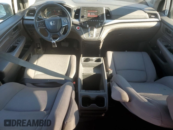 2018 Honda Odyssey LX with VIN 5FNRL6H22JB087152, listed as a Copart auction lot 76754974 with 73,057 mi miles and Salvage Title. Bid and sale history available at carsss.com. Image 8.