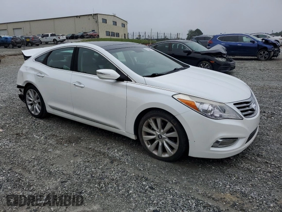 2014 Hyundai Azera Limited z VIN KMHFH4JG1EA388388, wystawiony jako Copart lot #58166675 z przebiegiem Nie podano mil oraz Szkoda całkowita • Salvage title. Historia ofert i sprzedaży dostępna na DreamBid. Obrazek 4.
