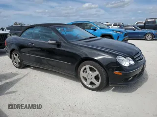2004 Mercedes-Benz CLK 500 with VIN WDBTK75G04T005692, listed as a Copart auction lot 77038514 with 125,997 mi miles and Salvage Title. Bid and sale history available at DreamBid. Image 4.