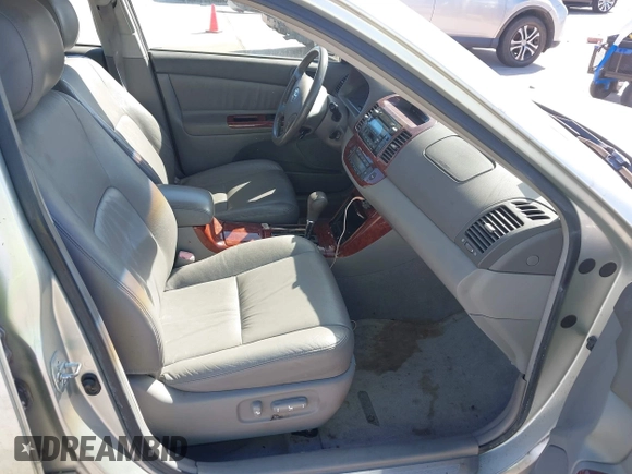 2005 Toyota Camry LE with VIN JTDBF32KX50162491, listed as a IAAI auction lot 41828892 with 98,541 mi miles and . Bid and sale history available at DreamBid. Image 5.