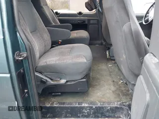 1996 Ford Econoline Cargo with VIN 1FMEE11H3THB23052, listed as a IAAI auction lot 41943008 with 161,522 mi miles and . Bid and sale history available at DreamBid. Image 8.