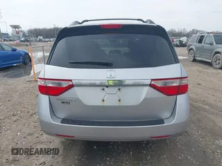 2013 Honda Odyssey LX with VIN 5FNRL5H22DB086503, listed as a IAAI auction lot 42133471 with 223,200 mi miles and . Bid and sale history available at carsss.com. Image 17.