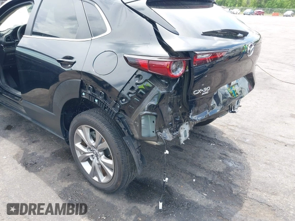 2023 Mazda CX-30 S Carbon Edition с VIN 3MVDMBCM7PM549197, выставлен на аукционе IAAI как лот 42224977 с пробегом 22 201 миль миль и . История ставок и продаж доступна на DreamBid. Изображение 6.