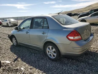 2007 Nissan Versa 1.8 S with VIN 3N1BC11E17L446450, listed as a Copart auction lot 52631415 with 121,006 mi miles and Salvage Title. Bid and sale history available at carsss.com. Image 2.