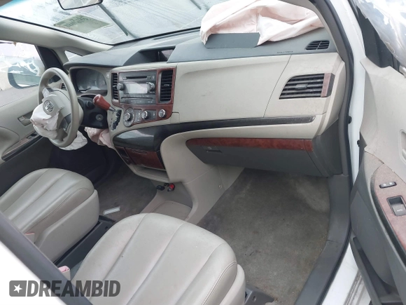 2012 Toyota Sienna with VIN 5TDZK3DCXCS271365, listed as a IAAI auction lot 38121628 with 101,756 mi miles and . Bid and sale history available at DreamBid. Image 5.