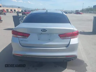 2018 Kia Optima LX with VIN 5XXGT4L31JG267716, listed as a IAAI auction lot 41890611 with 63,491 mi miles and . Bid and sale history available at carsss.com. Image 16.