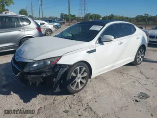2012 Kia Optima SX with VIN 5XXGR4A6XCG017695, listed as a IAAI auction lot 41837506 with 210,845 mi miles. Bid and sale history available at carsss.com. Image 2.