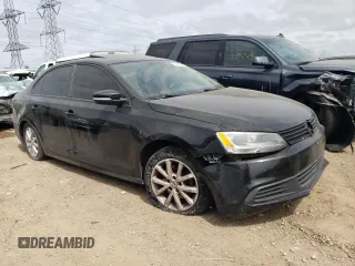 2011 Volkswagen Jetta SE with VIN 3VWDX7AJ6BM395554, listed as a Copart auction lot 57397585 with 139,857 mi miles and Salvage title. Bid and sale history available at DreamBid. Image 4.