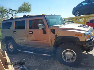 2005 Hummer H2 SUV with VIN 5GRGN23U85H129007, listed as a IAAI auction lot 41625417 with 102,389 mi miles. Bid and sale history available at carsss.com. Image 13.