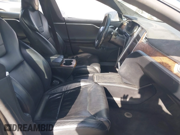 2017 Tesla Model S 100D z VIN 5YJSA1E20HF189557, wystawiony jako IAAI lot #41546084 z przebiegiem 253 218 mil mil oraz . Historia ofert i sprzedaży dostępna na DreamBid. Obrazek 5.