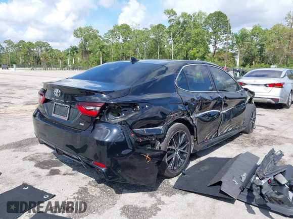 2023 Toyota Camry SE with VIN 4T1G11AK6PU741172, listed as a IAAI auction lot 41599909 with 56,668 mi miles and . Bid and sale history available at DreamBid. Image 20.