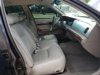 1999 Mercury Grand Marquis LS с VIN 2MEFM75W2XX683074, выставлен на аукционе Copart как лот 55679225 с пробегом 198 956 миль миль и Списание • Salvage title. История ставок и продаж доступна на DreamBid. Изображение 7.