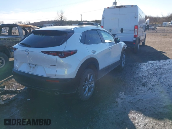2022 Mazda CX-30 S Select z VIN 3MVDMBBL8NM448787, wystawiony jako IAAI lot #41577914 z przebiegiem 64 552 mil mil oraz . Historia ofert i sprzedaży dostępna na DreamBid. Obrazek 4.