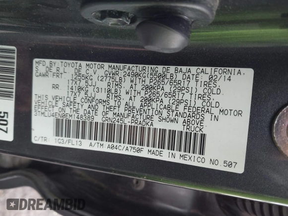 2014 Toyota Tacoma with VIN 3TMLU4EN0EM148389, listed as a IAAI auction lot 41490721 with 119,731 mi miles. Bid and sale history available at carsss.com. Image 9.