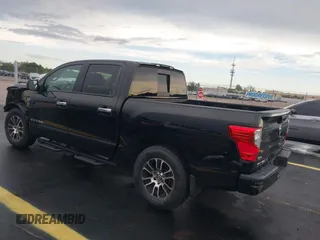 2021 Nissan Titan SV with VIN 1N6AA1EF4MN503458, listed as a IAAI auction lot 42401074 with 53,558 mi miles and . Bid and sale history available at DreamBid. Image 3.