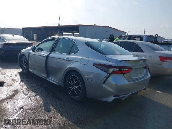2021 Toyota Camry SE Nightshade with VIN 4T1G11AKXMU599663, listed as a IAAI auction lot 41902392 with 76,909 mi miles. Bid and sale history available at carsss.com. Image 3.