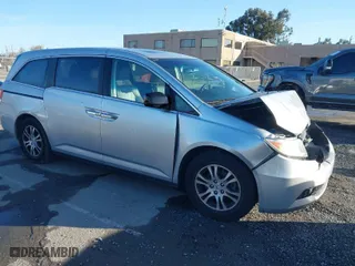 2011 Honda Odyssey EX-L with VIN 5FNRL5H6XBB057556, listed as a IAAI auction lot 41808620 with 154,449 mi miles. Bid and sale history available at carsss.com. Image 1.