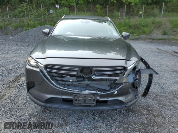 2021 Mazda CX-9 Touring with VIN JM3TCBCY6M0512571, listed as a Copart auction lot 59417475 with 37,865 mi miles and Salvage title. Bid and sale history available at DreamBid. Image 5.