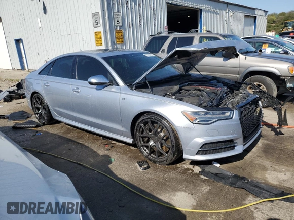 2016 Audi S6 Premium Plus z VIN WAUF2AFC8GN050375, wystawiony jako Copart lot #73994004 z przebiegiem 73 017 mil mil oraz Szkoda całkowita • Salvage title. Historia ofert i sprzedaży dostępna na DreamBid. Obrazek 4.