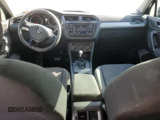 2018 Volkswagen Tiguan S with VIN 3VV0B7AX2JM019924, listed as a Copart auction lot 56138375 with 76,798 mi miles and Salvage title. Bid and sale history available at DreamBid. Image 8.