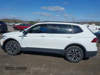2024 Volkswagen Tiguan S with VIN 3VVFB7AX7RM063715, listed as a IAAI auction lot 41974650 with 23,374 mi miles and . Bid and sale history available at DreamBid. Image 13.