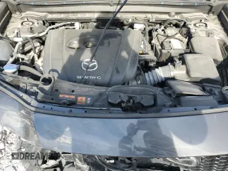 2021 Mazda CX-30 Premium z VIN 3MVDMBDL2MM315521, wystawiony jako Copart lot #75791414 z przebiegiem 23 515 mil mil oraz Szkoda całkowita • Salvage title. Historia ofert i sprzedaży dostępna na DreamBid. Obrazek 13.