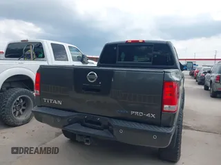 2011 Nissan Titan Pro-4X with VIN 1N6BA0EC3BN320795, listed as a IAAI auction lot 41868113 with 183,919 mi miles and . Bid and sale history available at DreamBid. Image 16.