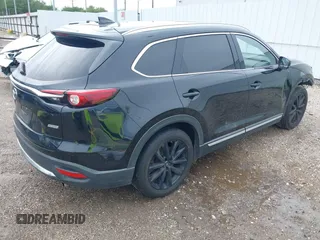 2018 Mazda CX-9 Grand Touring with VIN JM3TCADY3J0228643, listed as a IAAI auction lot 42481641 with 121,714 mi miles and . Bid and sale history available at DreamBid. Image 4.