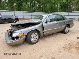 2003 Mercury Grand Marquis GS Convenience z VIN 2MEFM74W03X647685, wystawiony jako Copart lot #54104505 z przebiegiem 67 396 mil mil oraz Szkody całkowita. Historia ofert i sprzedaży dostępna na DreamBid. Obrazek 1.