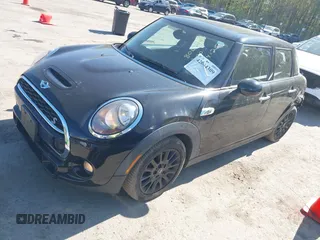 2016 MINI Hardtop 4 Door S z VIN WMWXU3C51G2D29400, wystawiony jako IAAI lot #42064309 z przebiegiem 85 021 mil mil oraz . Historia ofert i sprzedaży dostępna na DreamBid. Obrazek 2.